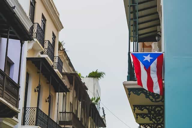 Puerto Rico’s flag hangs on a balcony.